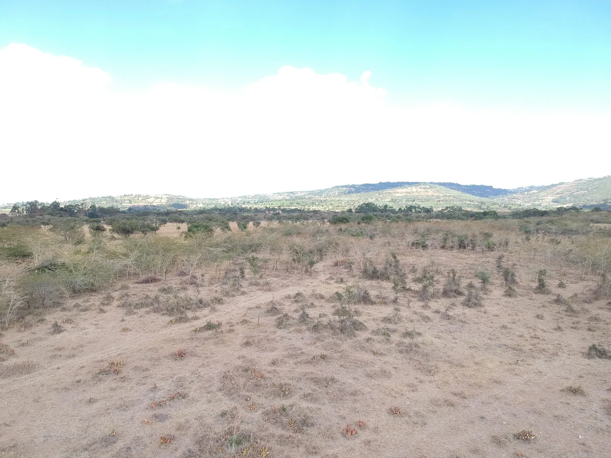 Aerial drone view of Baraka Gardens estate, Mavoko, Machakos County — beaconed 50x100 plots for sale (photo 01)